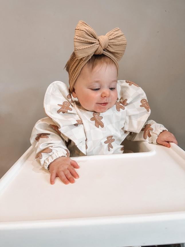 Gingham Gingerbread Man Christmas Print Frill Detailed Waterproof Bib with Sleeves - Betty Brown Boutique Ltd
