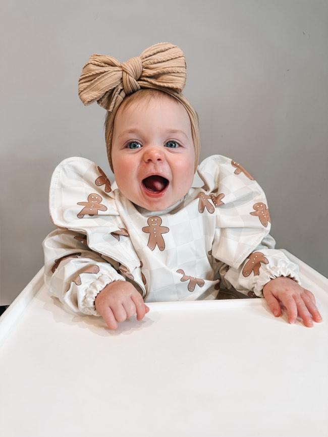 Gingham Gingerbread Man Christmas Print Frill Detailed Waterproof Bib with Sleeves - Betty Brown Boutique Ltd