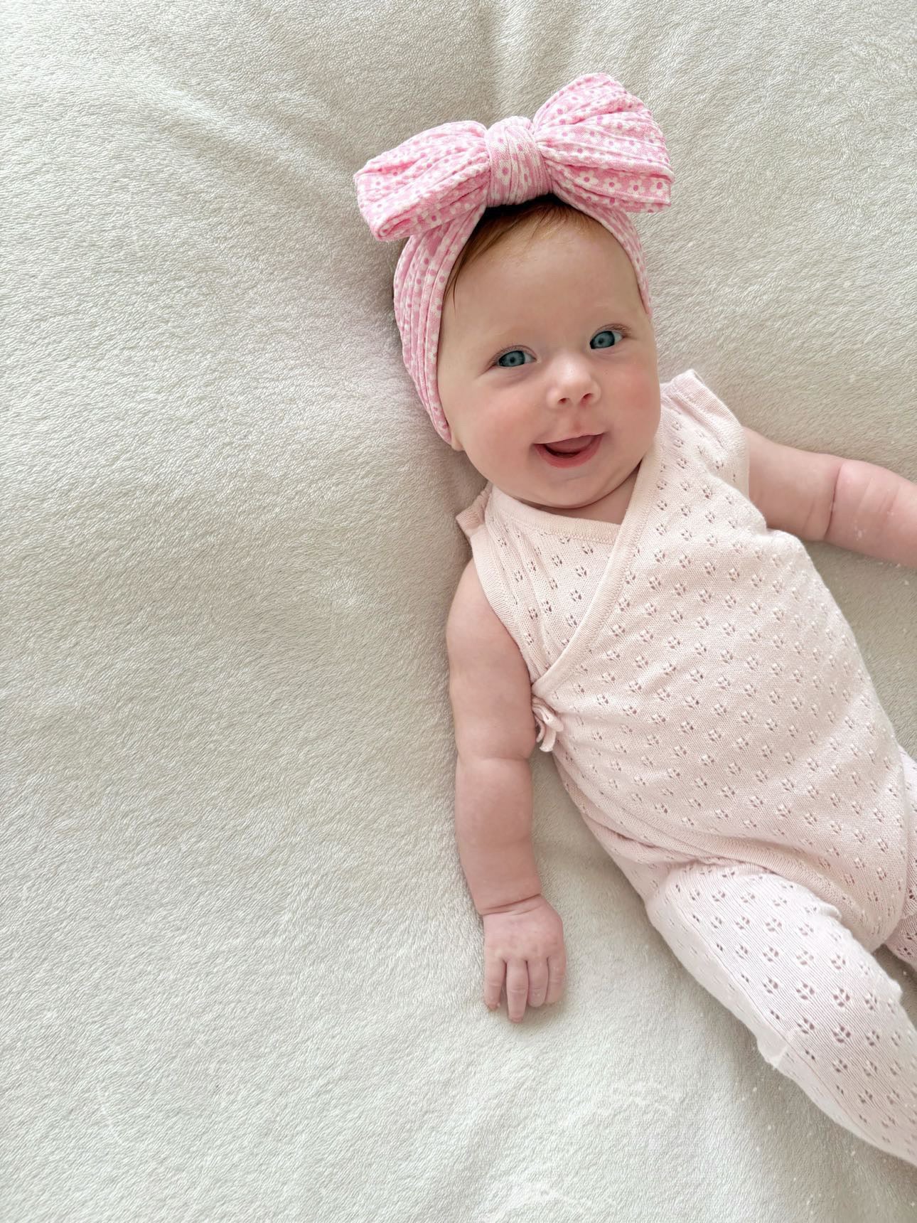 Pretty Pink Daisy Pattern Larger Bow Cable Knit Headband