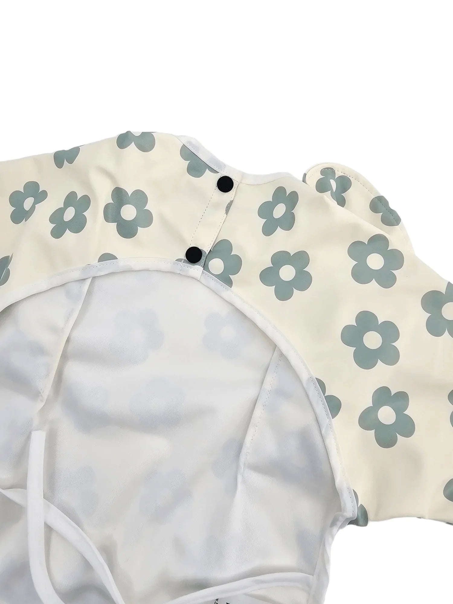 Cream and Sage Daisy Print Frill Detailed Waterproof Bib with Sleeves - Betty Brown Boutique Ltd