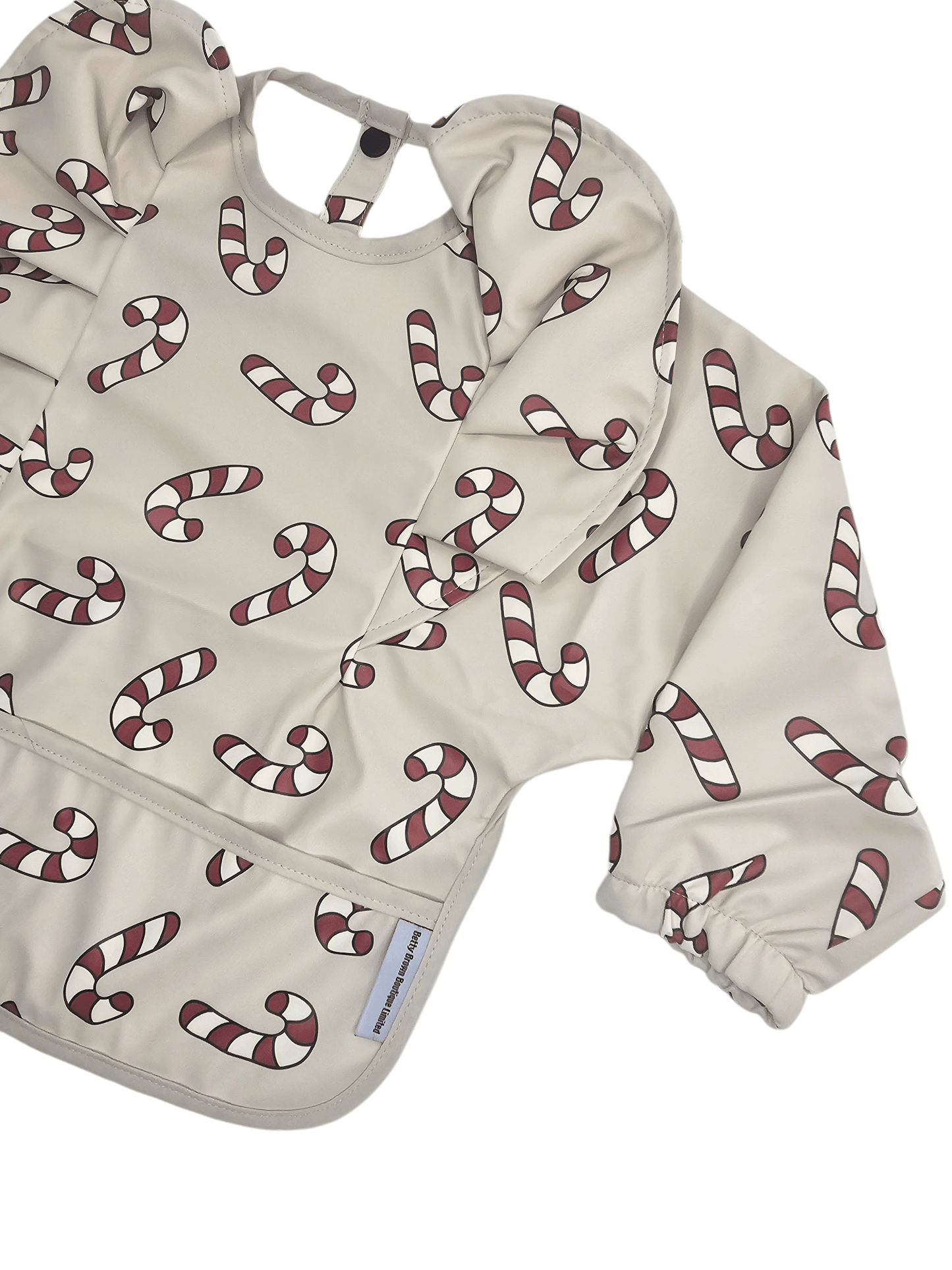 Neutral Candy Cane Christmas Print Frill Detailed Waterproof Bib with Sleeves - Betty Brown Boutique Ltd