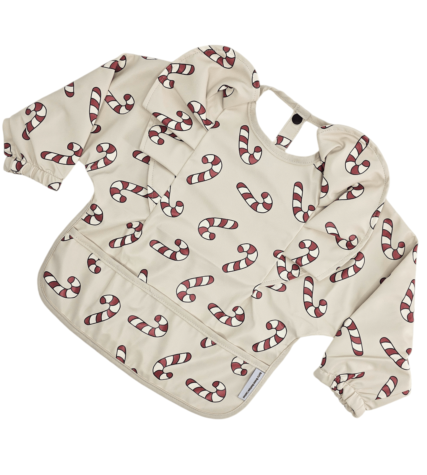 Neutral Candy Cane Christmas Print Frill Detailed Waterproof Bib with Sleeves - Betty Brown Boutique Ltd