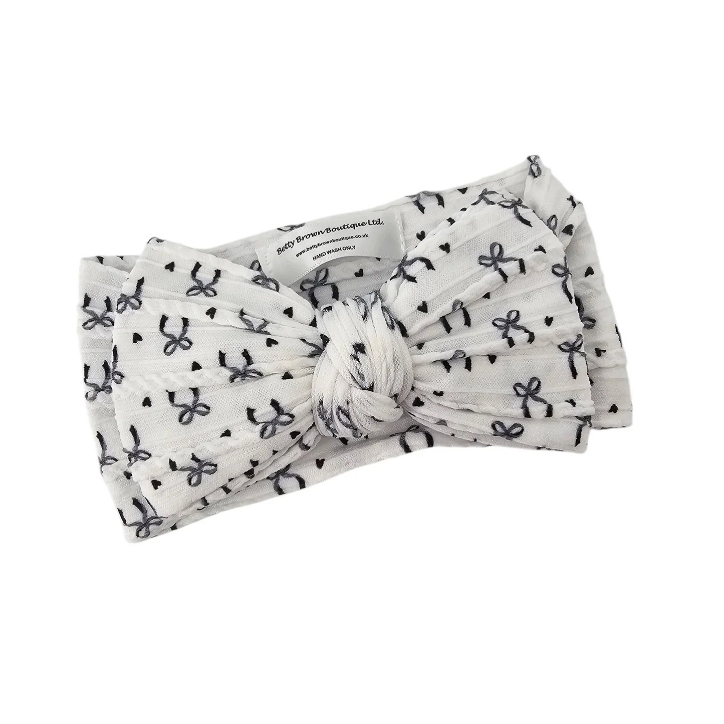 Black Bow Print Larger Bow Headband for Newborns to Age 3 - Image 2