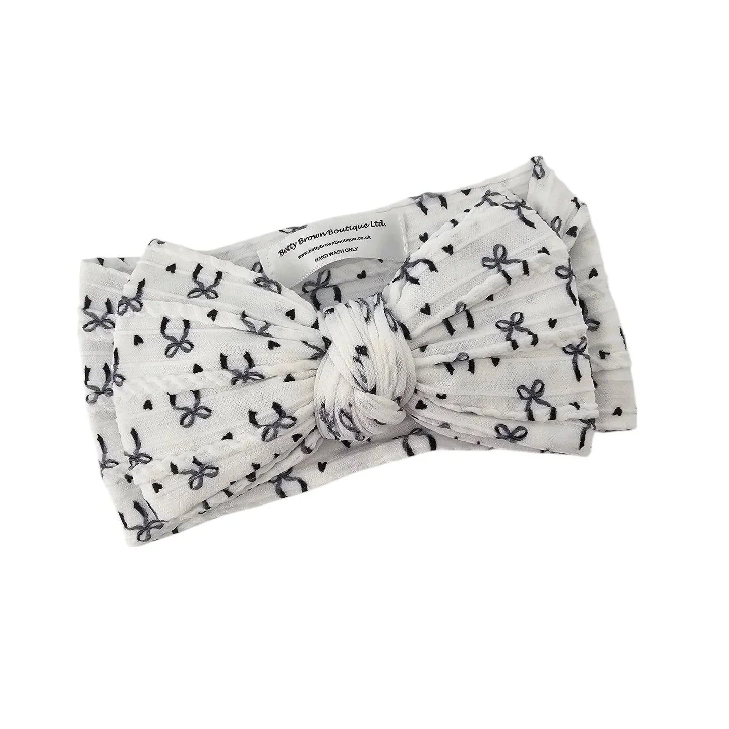 Black Bow Print Larger Bow Headband for Newborns to Age 3 - Image 2