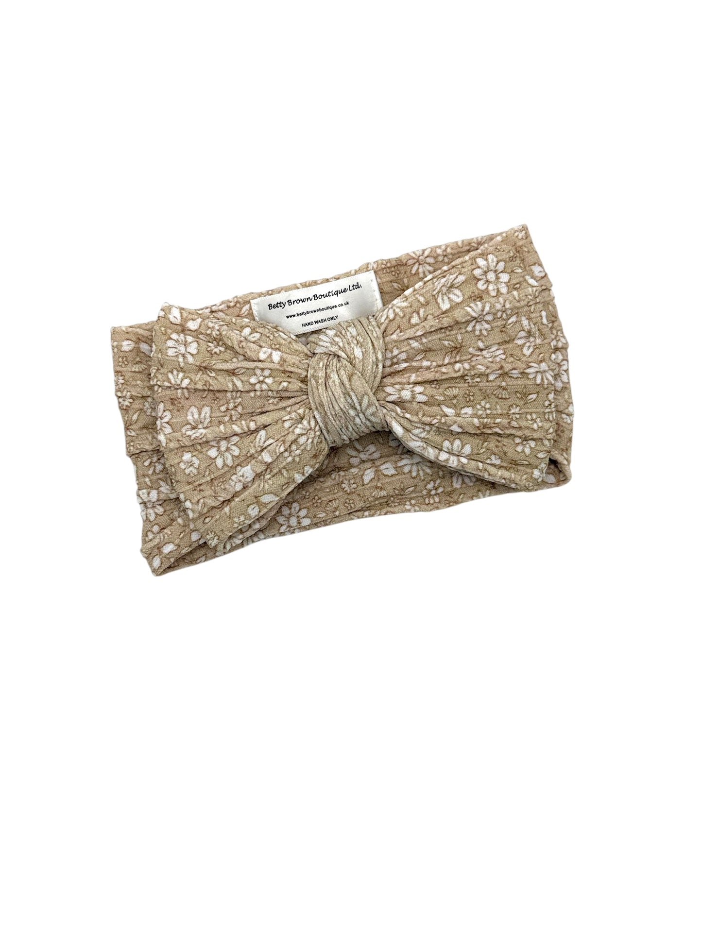 Neutral Floral Pattern Larger Bow Headband For Newborns - Image 1