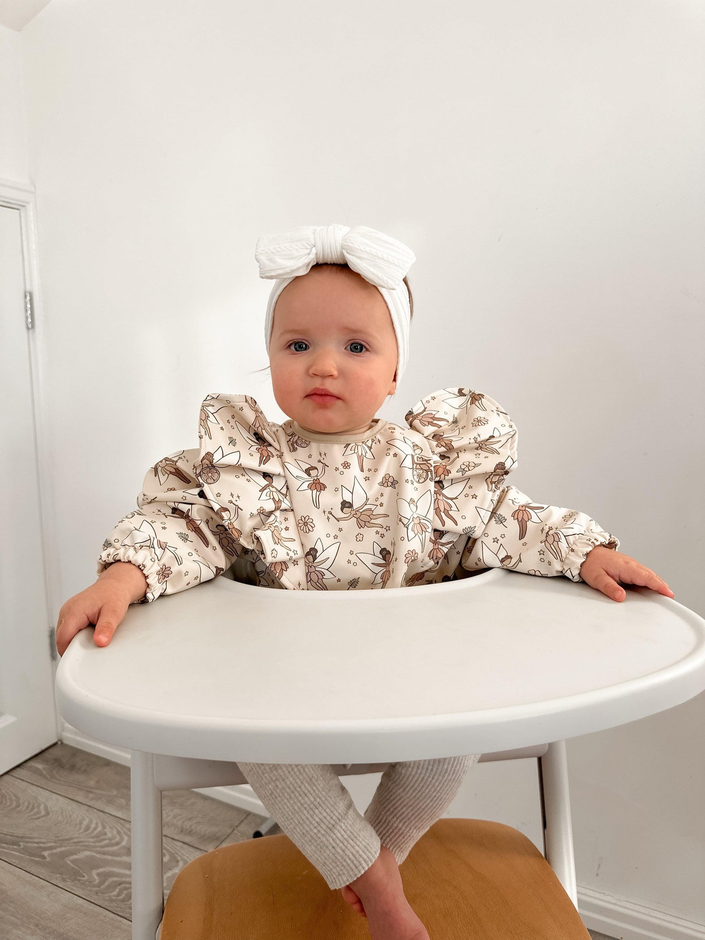 Neutral Fairy Print Frill Detailed Waterproof Bib with Sleeves - Betty Brown Boutique Ltd
