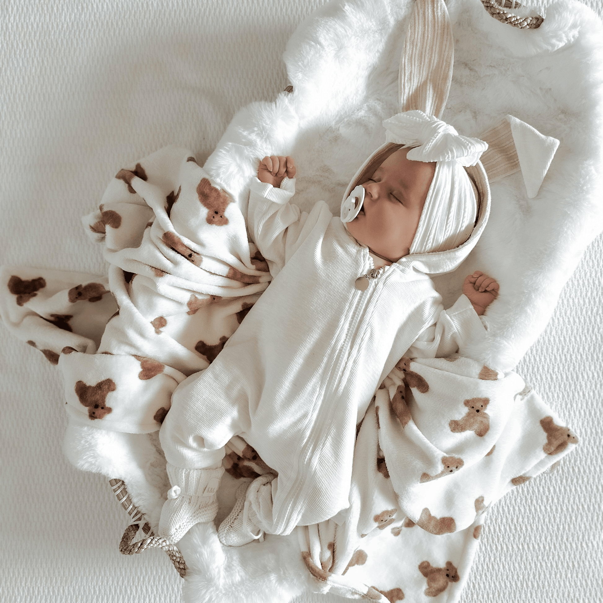 White Larger Bow Headband Designed For Newborn Babies to Age 3 - Image 2