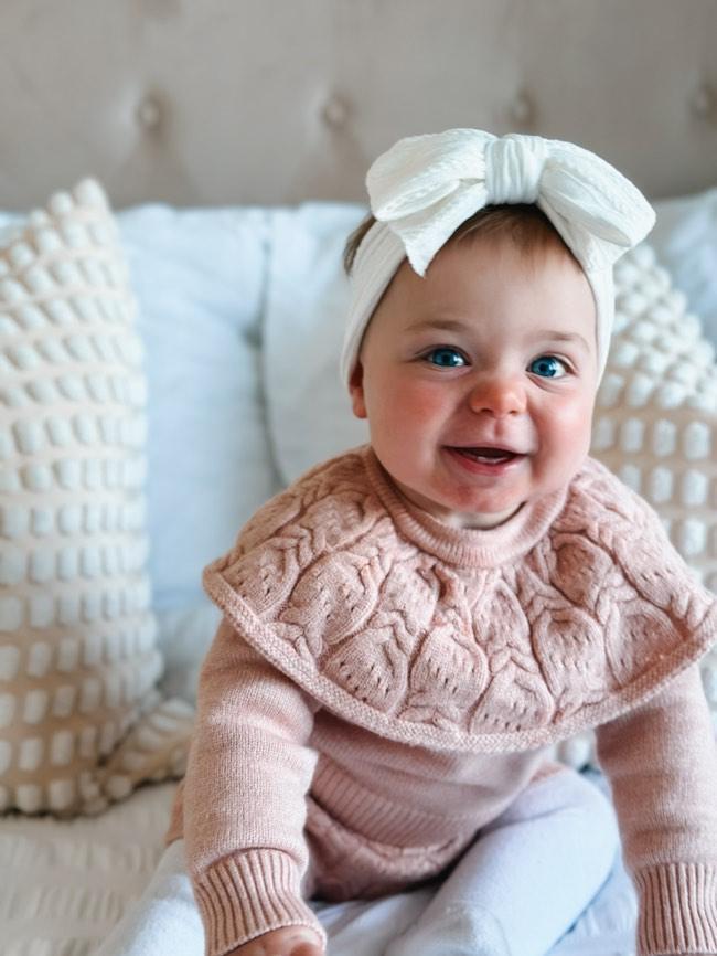 White Larger Bow Headband Designed For Newborn Babies to Age 3 - Image 6