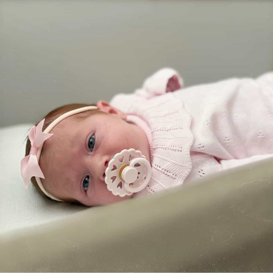 2 inch Light Pink Bow On Headband For Newborns to Toddlers - Image 1