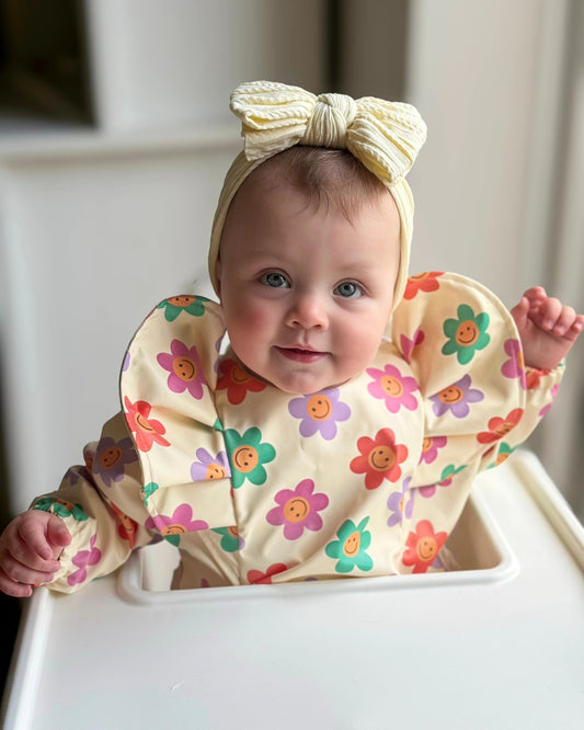 Smiley Daisy Print Frill Detailed Waterproof Bib with Sleeves - Betty Brown Boutique Ltd