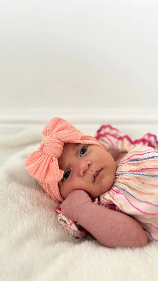 Peach Sunset Smaller Bow Cable Knit Headband