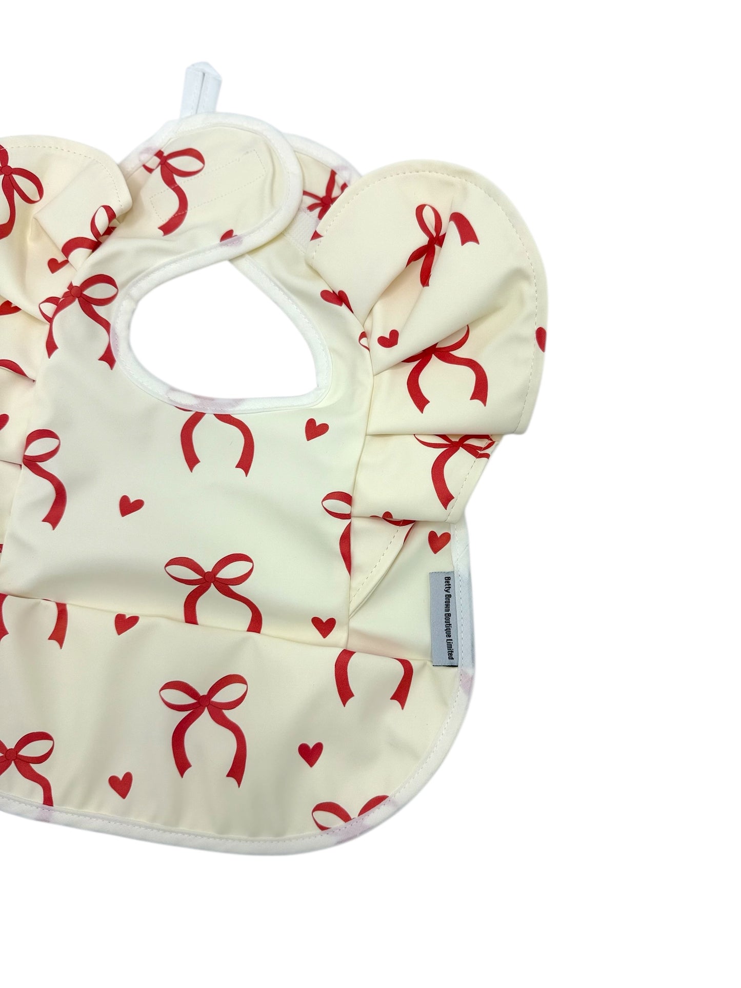 Cream and Red Bow Pattern Frill Detailed Waterproof Bib - 2025 Christmas Collection