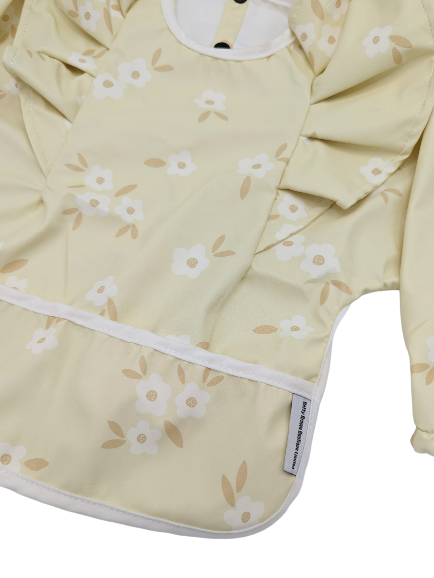 Lemon Ditsy Floral Print Frill Detail Waterproof Bib with sleeves - Betty Brown Boutique Ltd