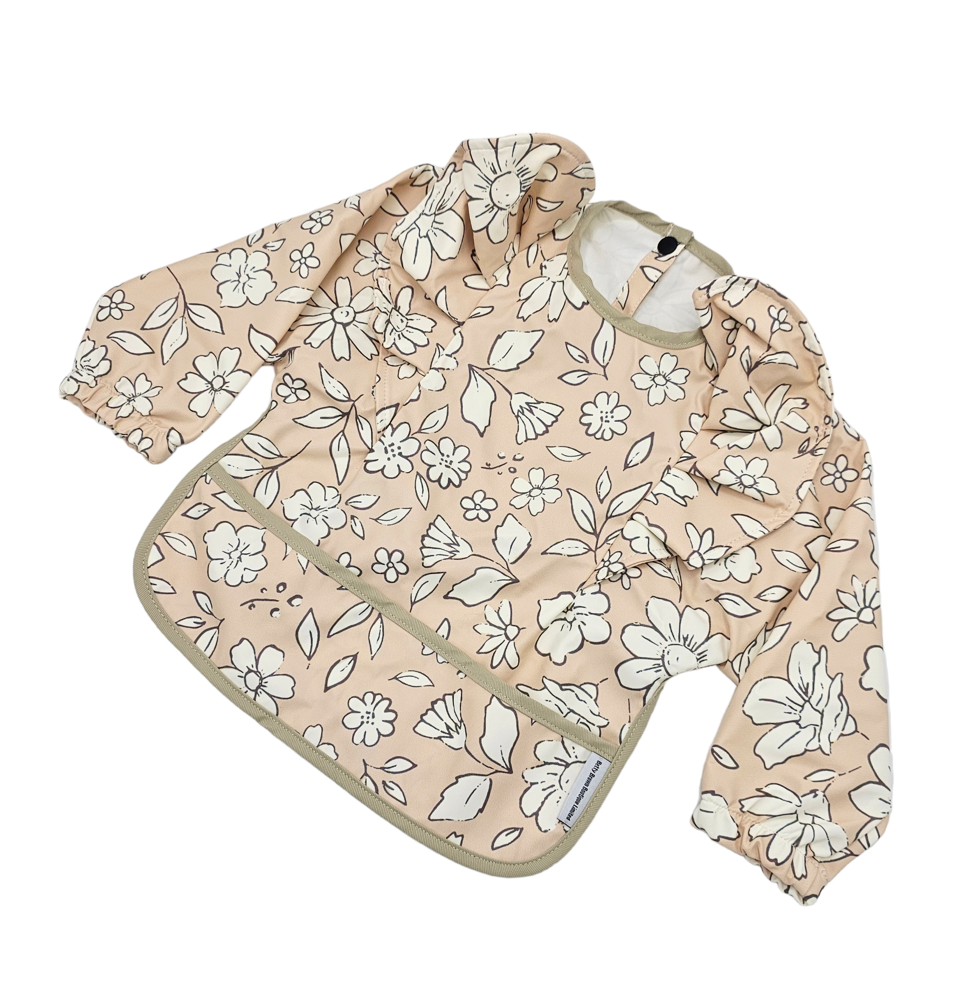 Beige Floral Frill Detail Waterproof Bib with Sleeves - Betty Brown Boutique Ltd