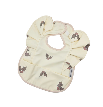 Cream Holly Print Frill Detail Waterproof Bib without Sleeves - Betty Brown Boutique Ltd