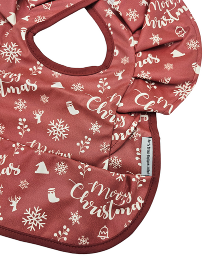 Red Merry Christmas Frill Detail Waterproof Bib without Sleeves - Christmas Collection - Betty Brown Boutique Ltd