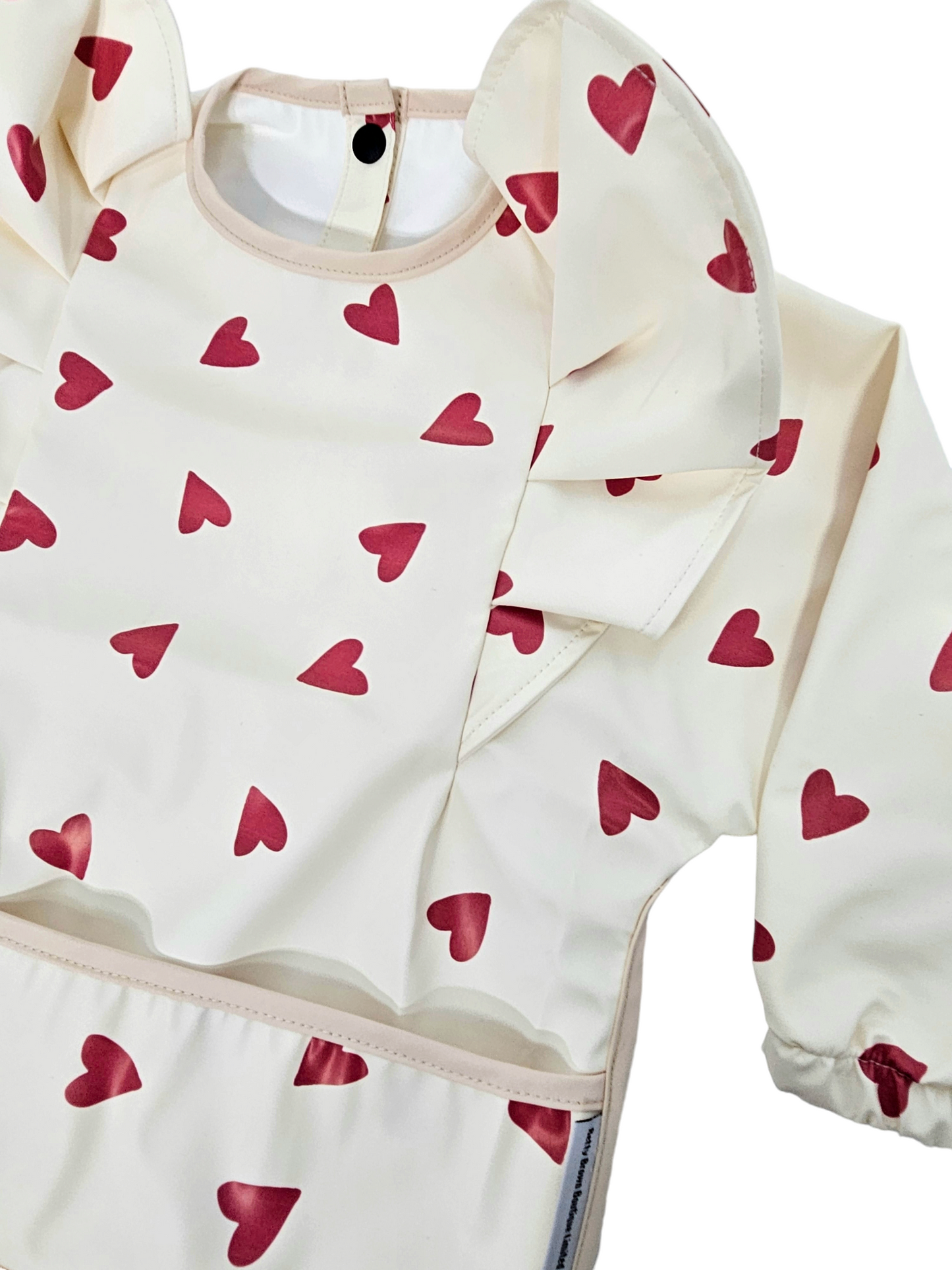 Red Heart Print Frill Detail Waterproof Bib with Sleeves - Betty Brown Boutique Ltd