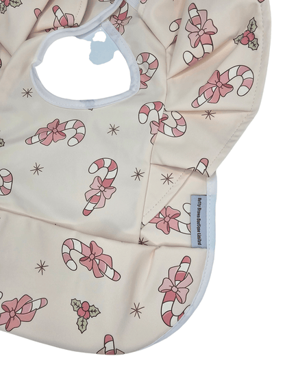 Pink Candy Cane Christmas Print Frill Detail Waterproof Bib