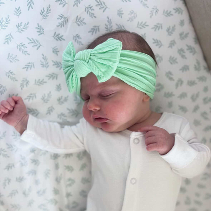 Apple Green Smaller Bow Headband For Newborn Babies to Age 3 - Image 1