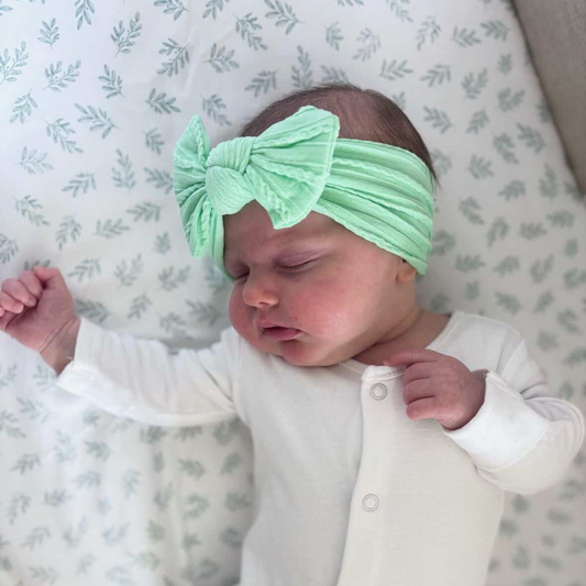 Apple Green Smaller Bow Headband For Newborn Babies to Age 3 - Image 1