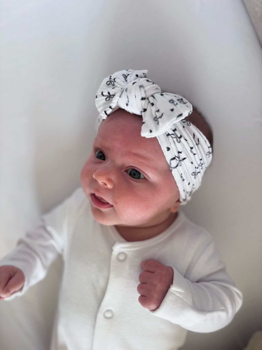 Shop Our Black Bow Print Headbands for Baby Girls - Image 1