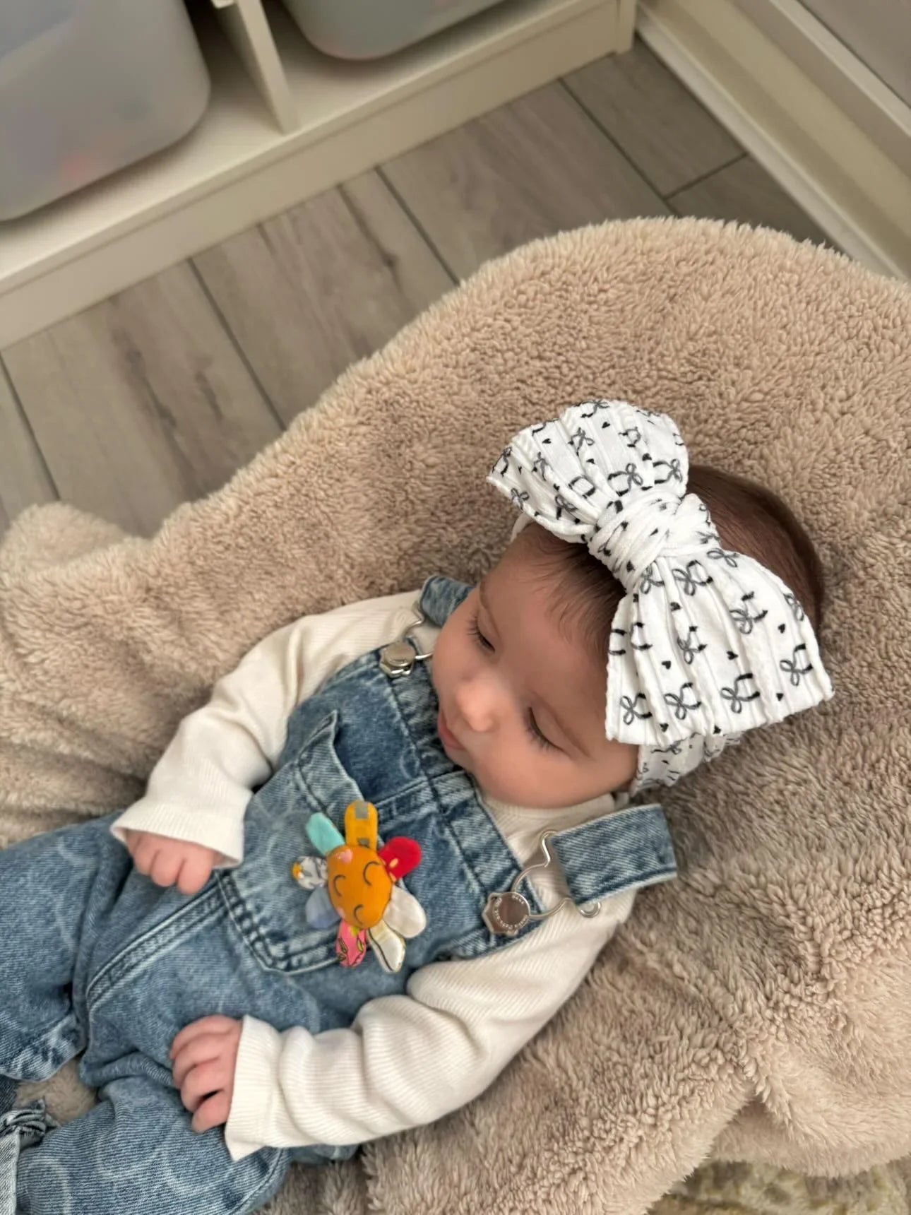 Black Bow Print Larger Bow Headband for Newborns to Age 3 - Image 1