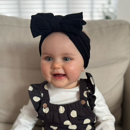 Black Larger Bow Headband Perfect For Newborns to Age 3 - Image 1