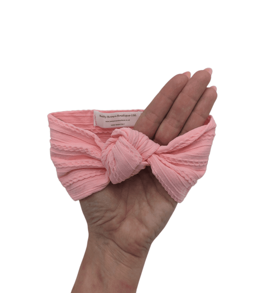 Bright Pink Knot Style Headband For Babies From Newborn - Image 1