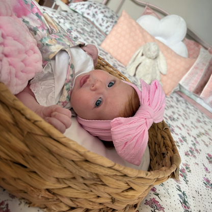 Carnation Pink Larger Bow Headband For Babies to Toddlers - Image 1