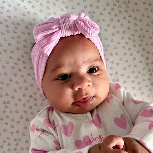 Carnation Pink Smaller Bow Headband For Babies From Newborn - Image 1