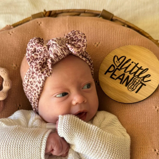 Leopard Print Smaller Bow Headband For Newborns to Age 3 - Image 1