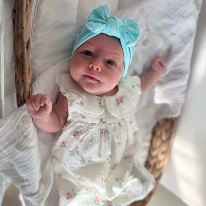 Light Blue Smaller Bow Headband For Newborns to 3 Years Old - Image 1