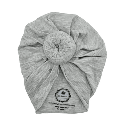 Light Grey Turban Hat with Donut For Newborns to 6 Months Old - Image 1