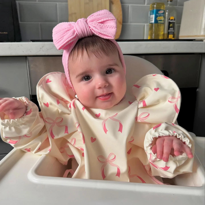 Light Pink Bow Bib with Sleeves For 6-36 Month Olds - Image 1