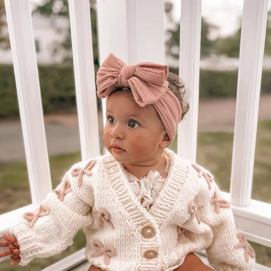 Lighter Dusty Pink Larger Bow Headband For Baby Girls - Image 1