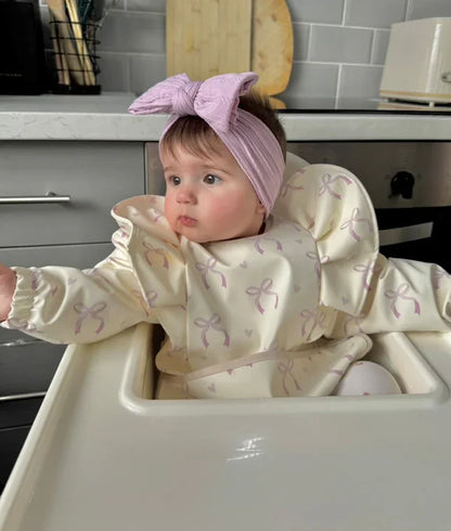 Lilac Bow Waterproof Bib with Sleeves For 6-36 Months - Image 2