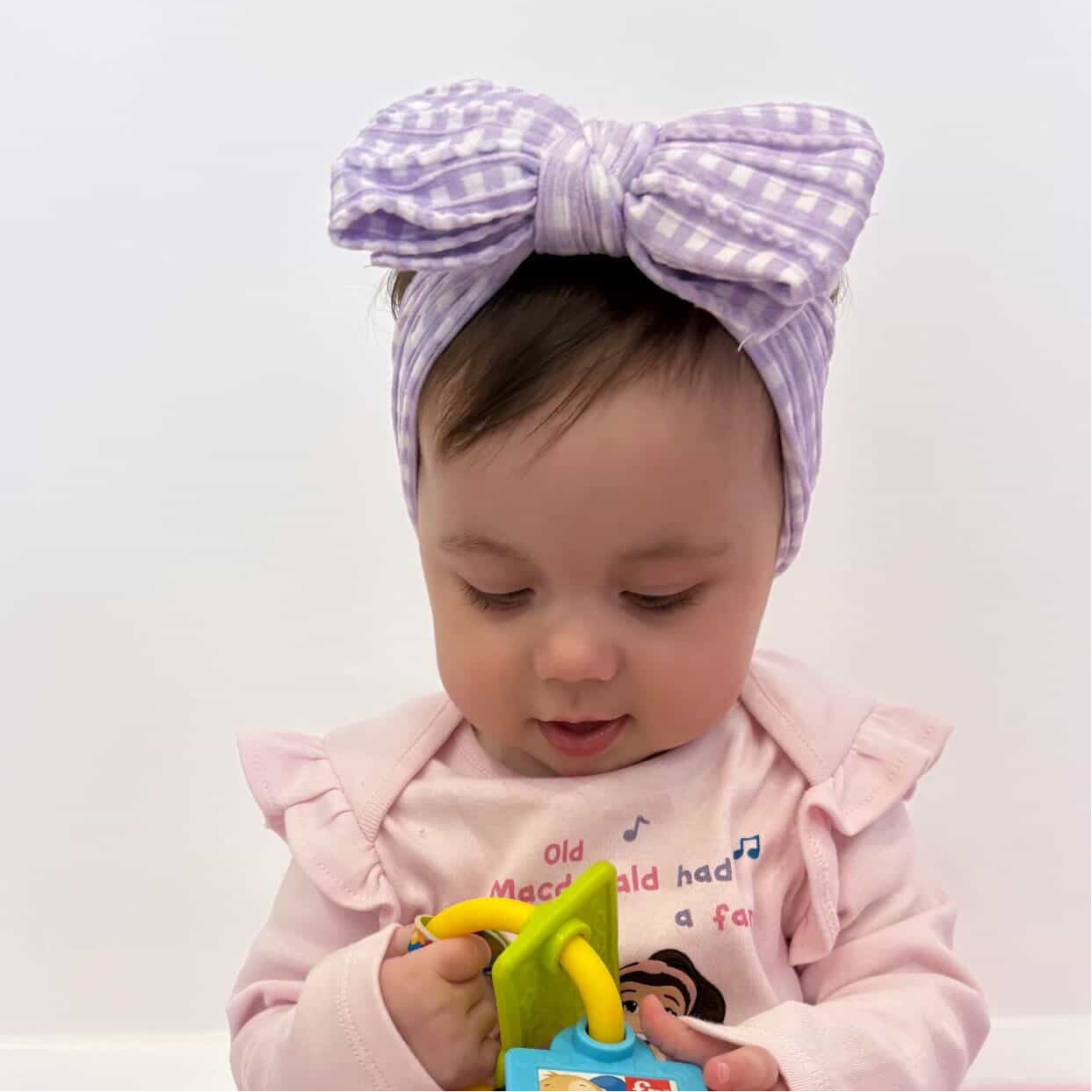 Lilac Gingham Larger Bow Headband For Girls From Newborn - Image 1