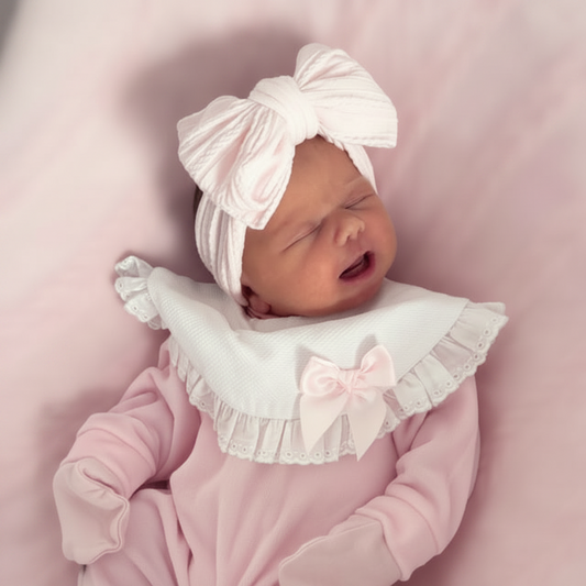 Marshmallow Pink Larger Bow Headband For Newborns to Age 3 - Image 1