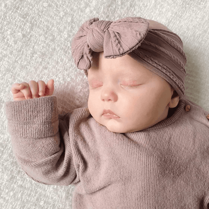 Mauve Smaller Bow Headband Suitable For Newborns to Toddler - Image 1