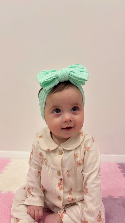 Mint Green Larger Bow Headband For Newborn Babies to Age 3 - Image 1