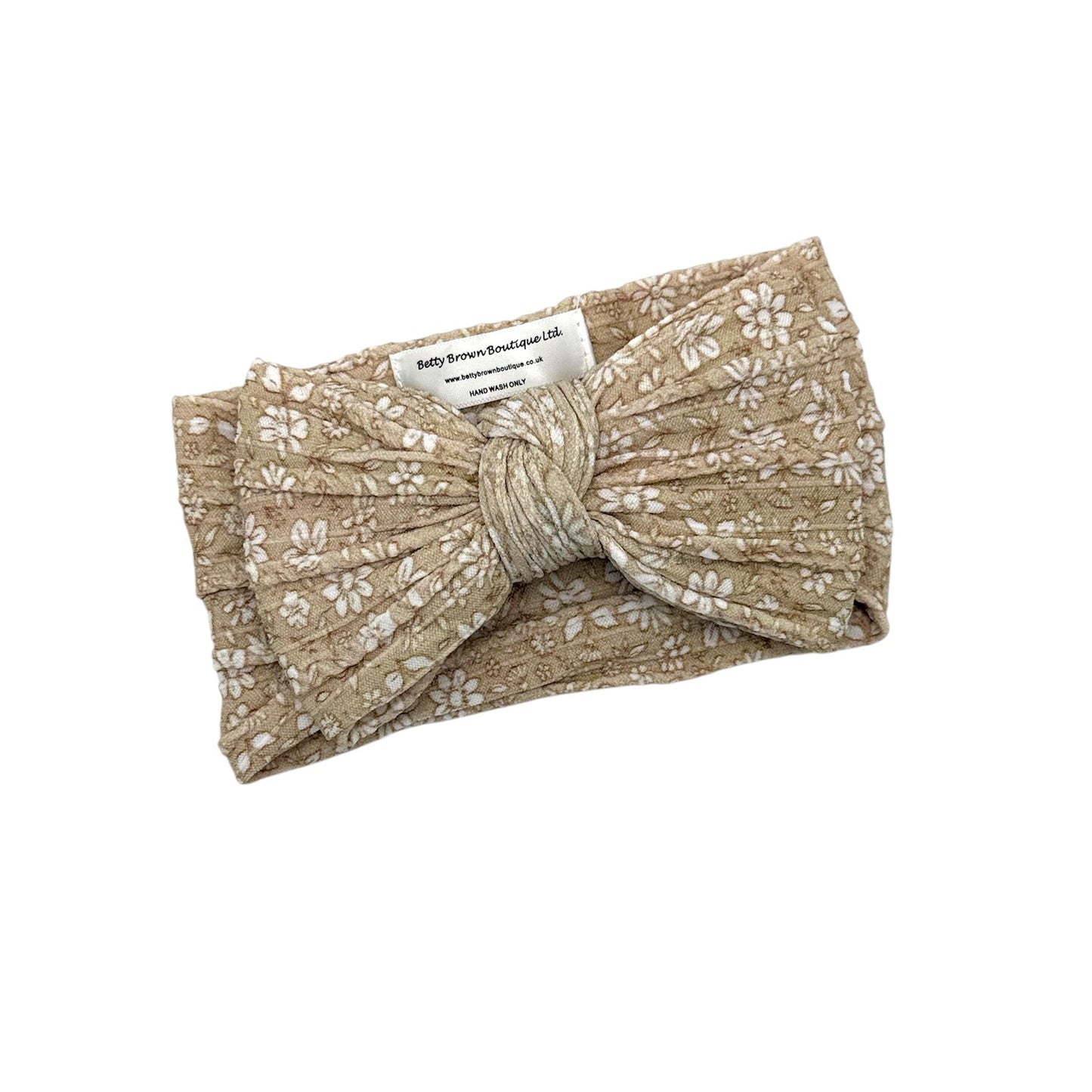 Neutral Floral Pattern Larger Bow Headband For Newborns - Image 1