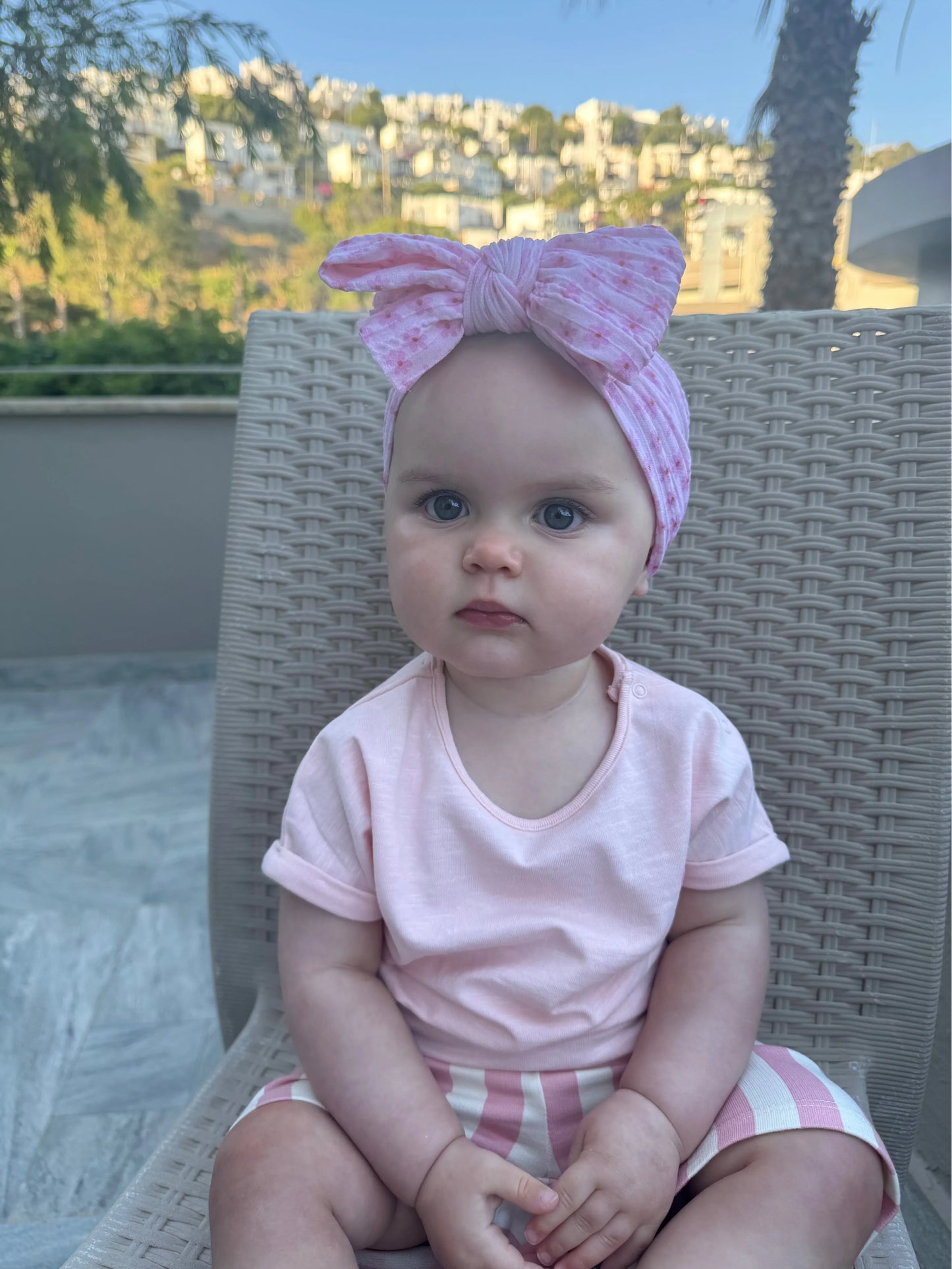 Pink Boho Daisy Larger Bow Headband For Newborns to Age 3 - Image 1