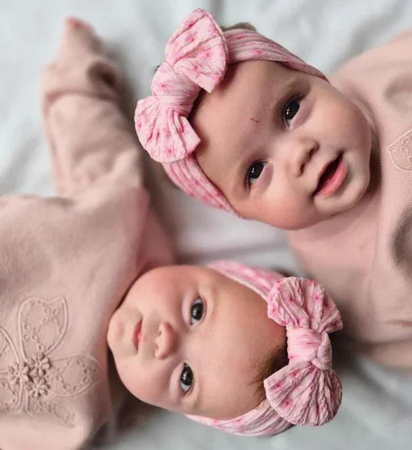 Pink Boho Daisy Print Smaller Bow Headband For Newborn to Age 3 - Image 1