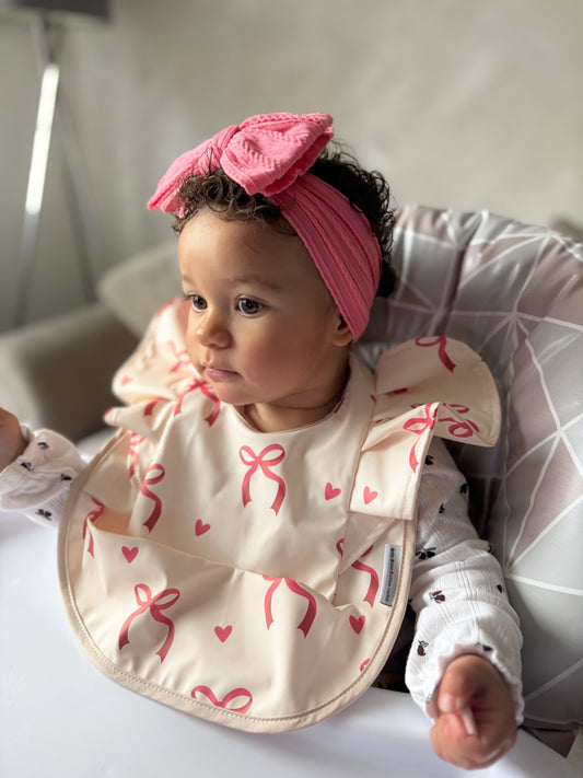 Pink Bow Print Waterproof Bib For 6-18 Months Old - Image 1