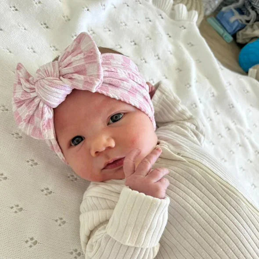 Pink Checkered Smaller Bow Headband For Girls From Newborn - Image 1