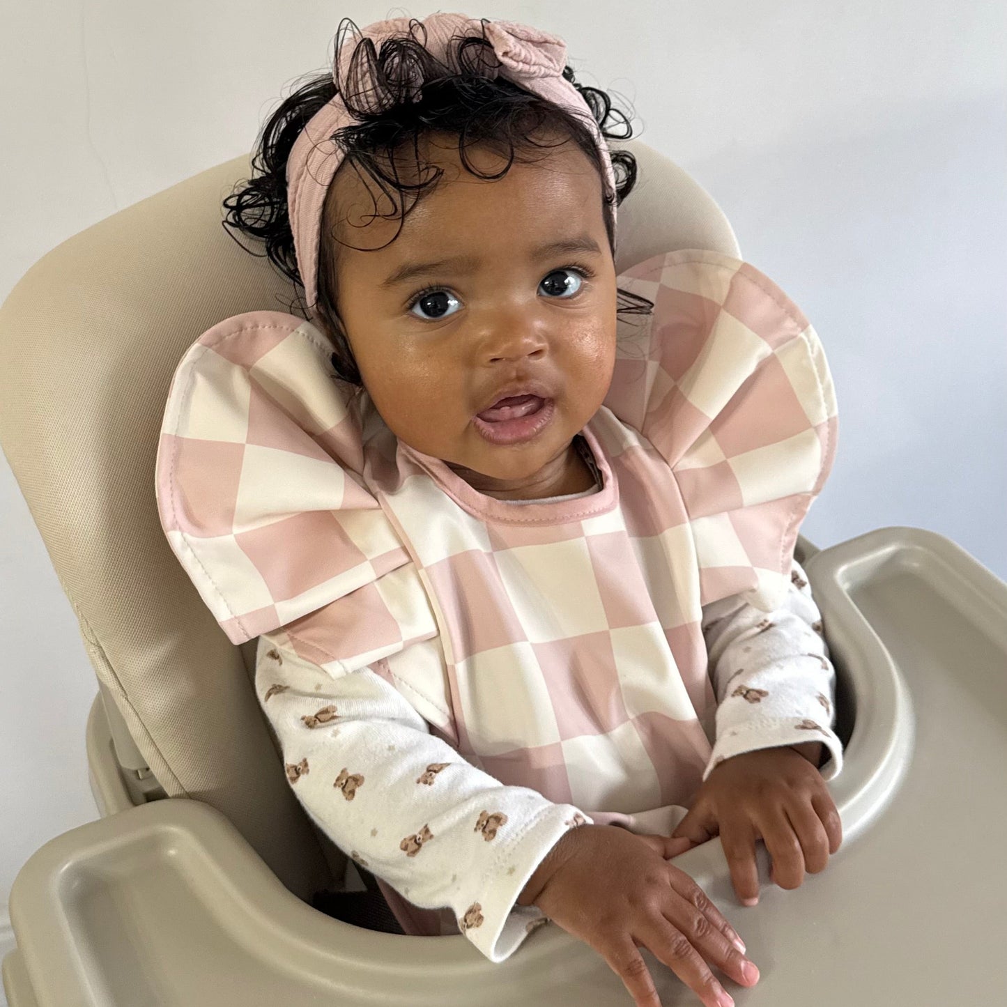 Pink Checkered Waterproof Bib For Girls From 6-18 Months - Image 1