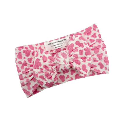 Pink Cow Print Smaller Bow Headband For Babies From Newborn - Image 2
