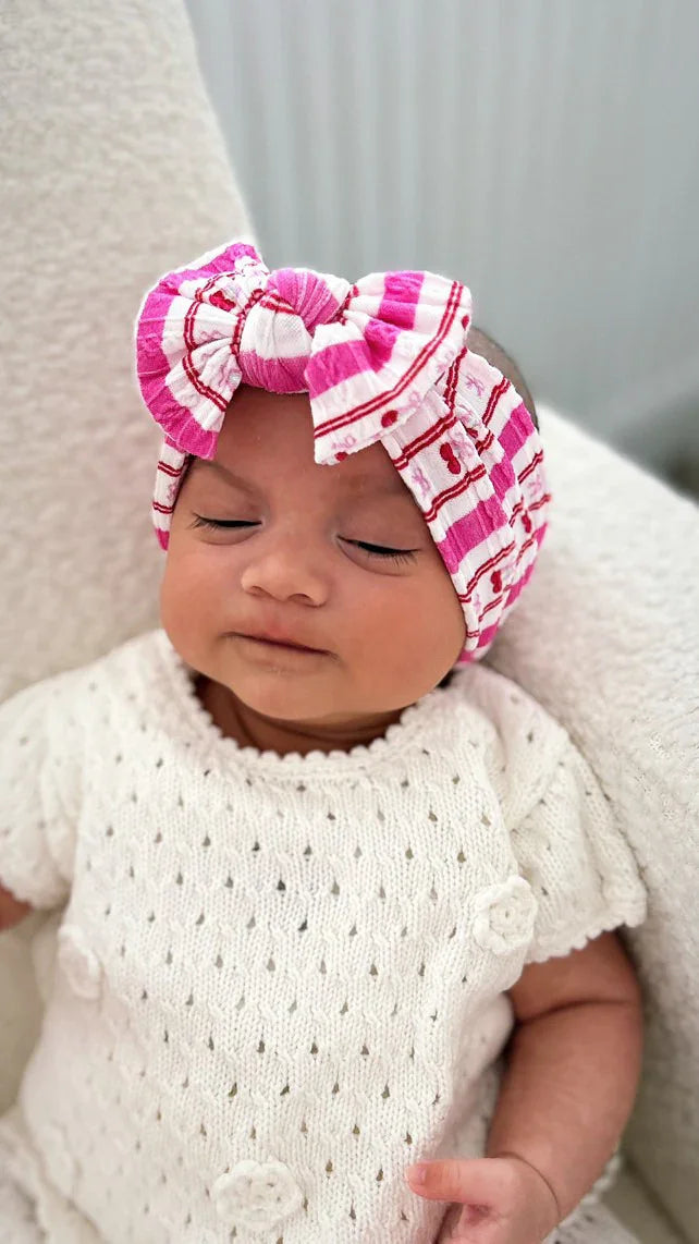 Pink Pinstripe Cherry Smaller Bow Headband For Baby Girls - Image 1