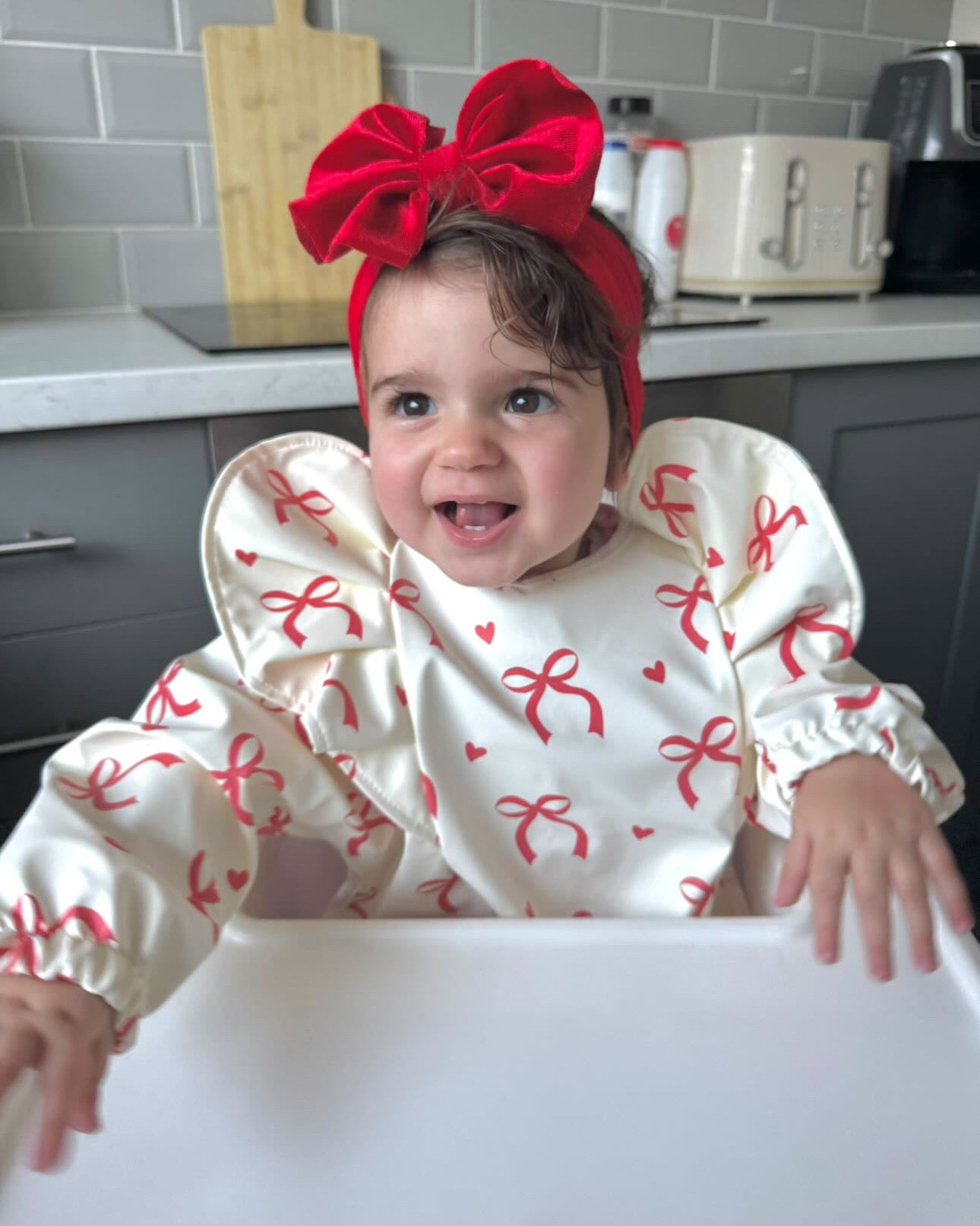 Red & Cream Bow Christmas Bib with Sleeves For 6-36 Months - Image 1