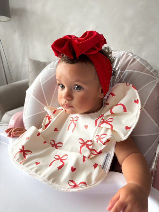 Cream and Red Bow Pattern Frill Detailed Waterproof Bib - 2025 Christmas Collection